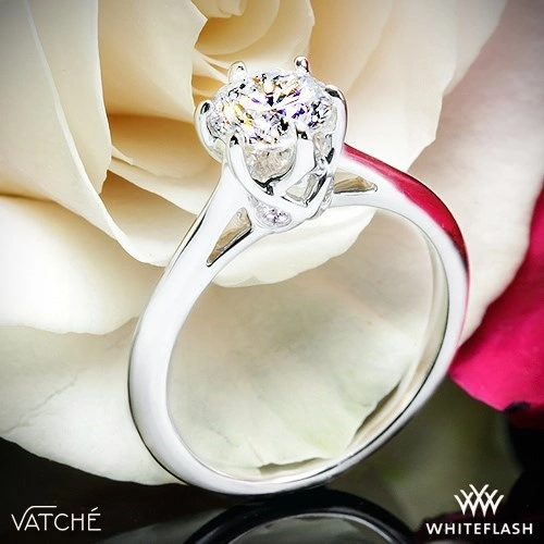 Solitaire Engagement Ring Embellished With a Four Prong Signature Head